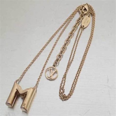 letter necklace louis vuitton|louis vuitton keyboard necklace.